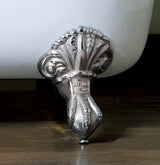 Close-up of brushed nickel claw foot from Still Waters Bath