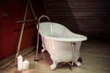 Samantha 61-inch Slipper Cast Iron Bathtub with Floor-Mount faucet and white feet from Still Waters Bath